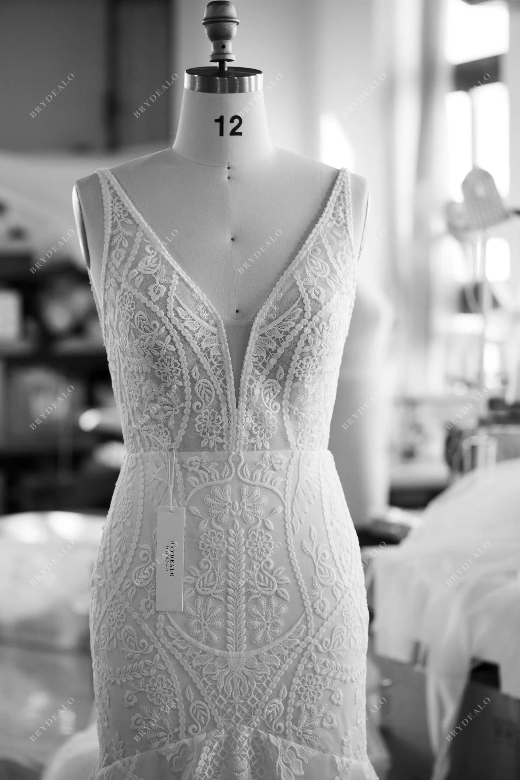 Sleeveless Plunging Designer Lace Champagne Mermaid Wedding Dress